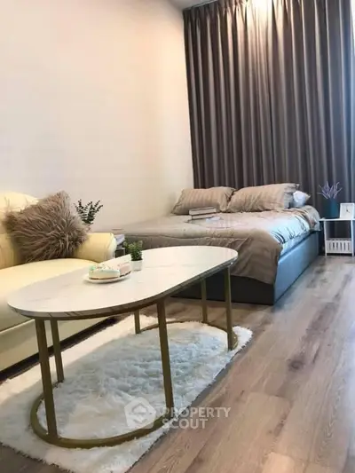Cozy bedroom with stylish decor and elegant furnishings, perfect for relaxation and comfort.