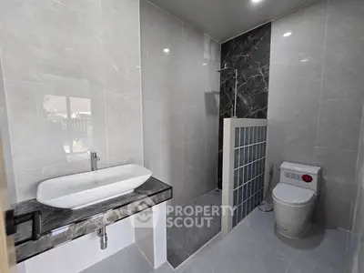 Modern bathroom with sleek design and glass partition shower