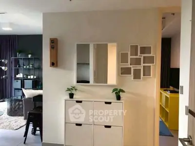 Modern interior with stylish decor and functional storage solutions in a cozy living space.
