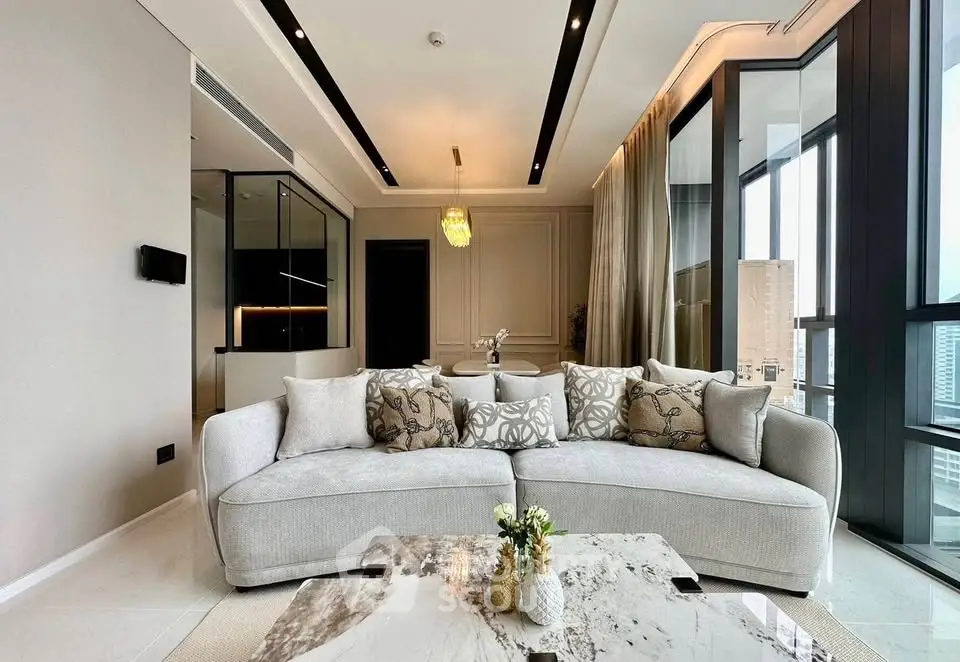 Luxurious modern living room with elegant decor and city view