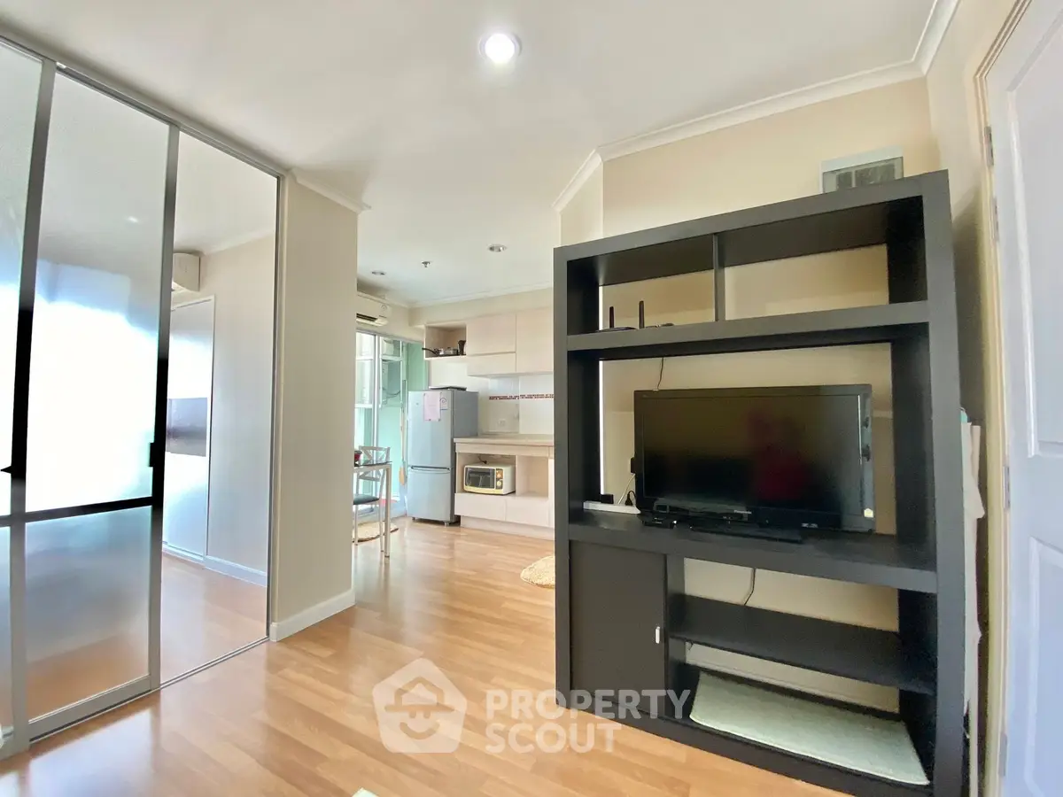 Modern apartment interior with open layout and sleek kitchen design