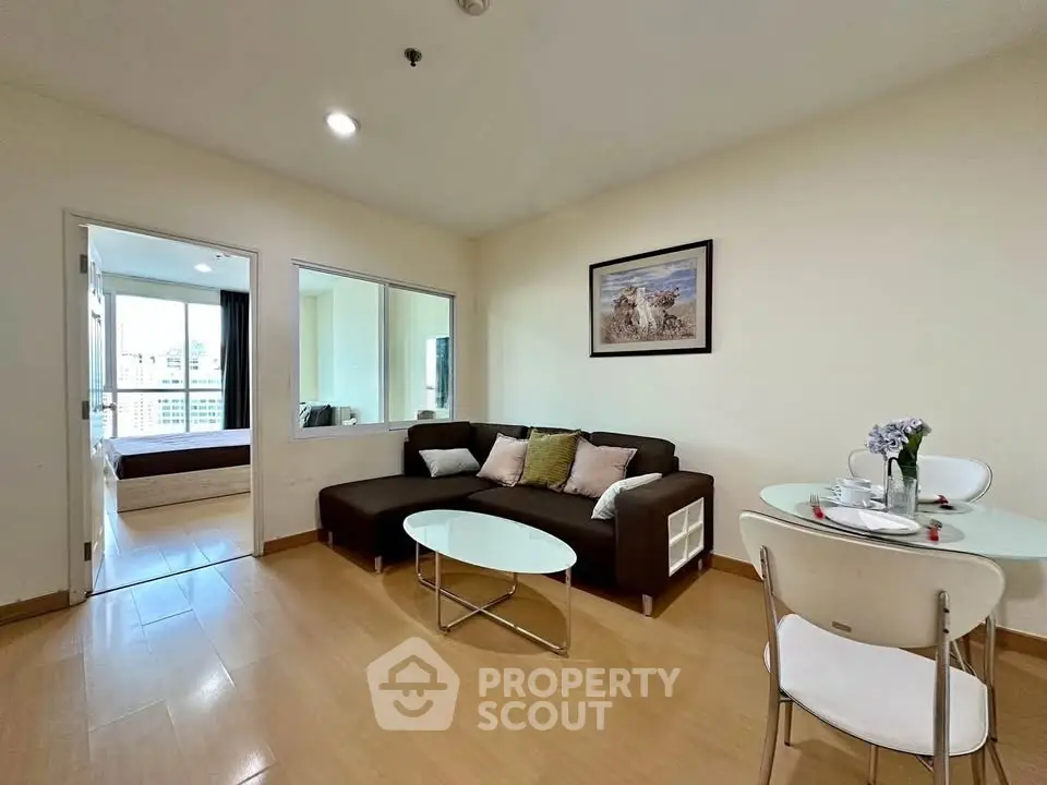 Modern living room with cozy sofa and dining area in a stylish apartment