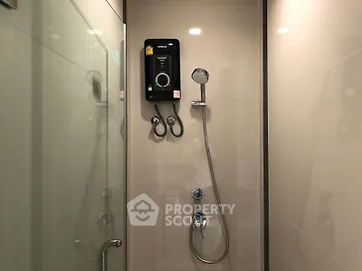 Modern bathroom shower with sleek design and high-quality fixtures in a contemporary home.