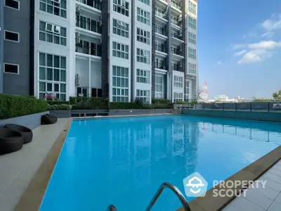 Luxurious condominium with stunning pool and modern architecture