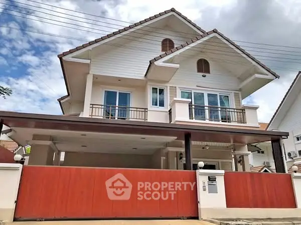 Charming two-story house with spacious balcony and modern design