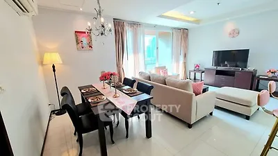 Spacious living room with elegant dining area and city view, perfect for modern urban living.