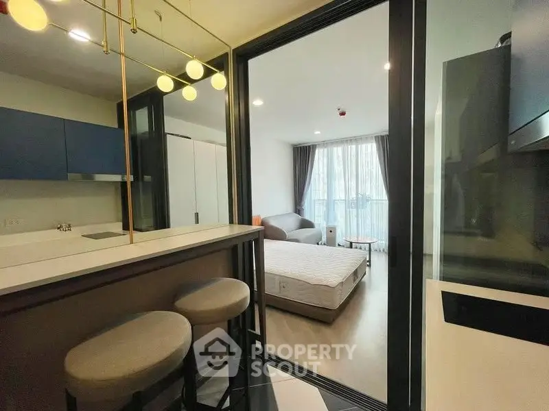 Modern studio apartment with open layout and stylish furnishings
