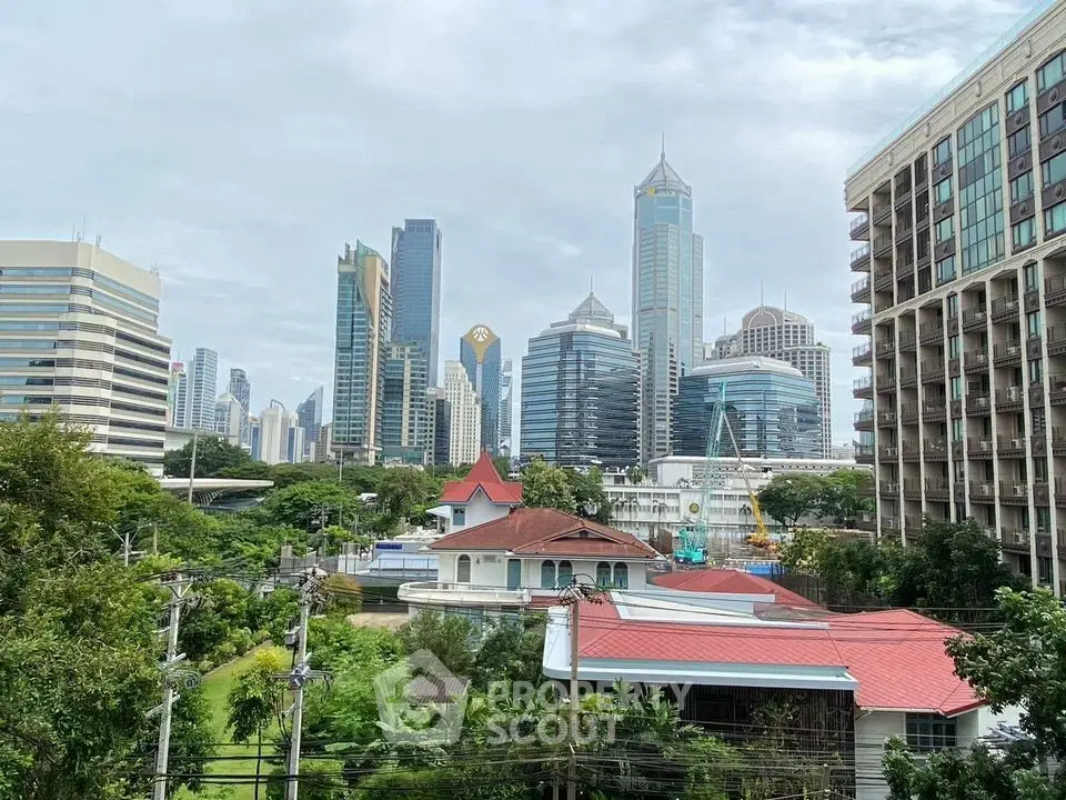Stunning cityscape view with modern skyscrapers and lush greenery, perfect for urban living enthusiasts.