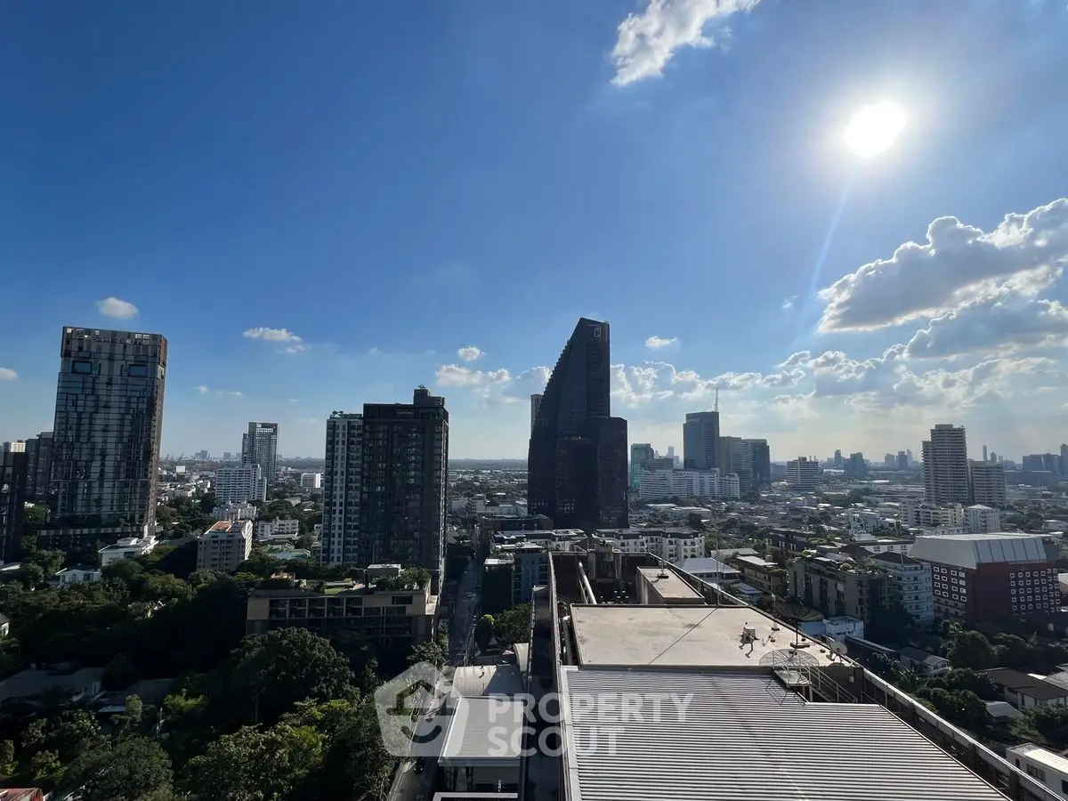 Stunning cityscape view with modern skyscrapers under a clear blue sky.