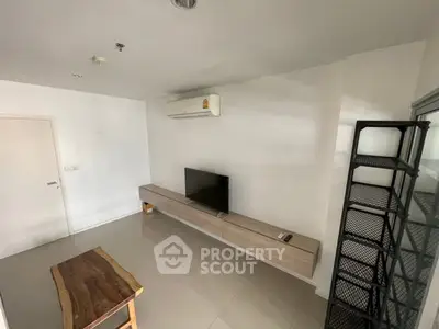 Modern living room with sleek TV setup and minimalist decor