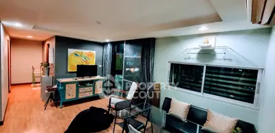  2 Bedrooms Condo at The Kris Express 2 Livingroom