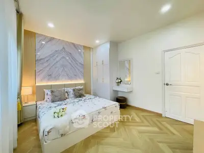 Elegant bedroom with modern decor and stylish lighting