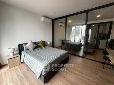 Modern bedroom with stylish decor and open layout in a contemporary apartment