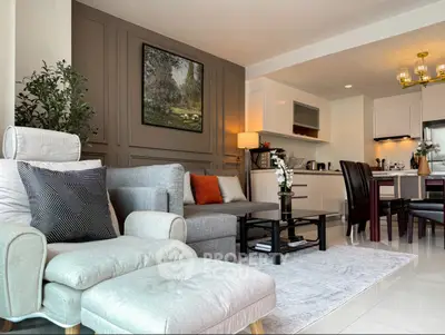 Stylish modern living room with open kitchen and elegant decor