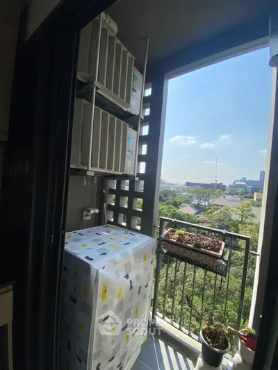 Charming balcony with city view, perfect for relaxation and enjoying the outdoors.