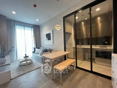 Modern living room with open kitchen and stylish decor