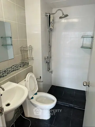 Modern bathroom with sleek shower and contemporary fixtures