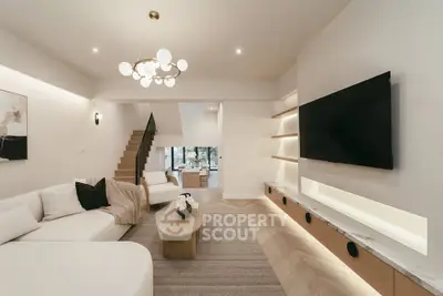 Luxurious modern living room with elegant lighting and spacious design