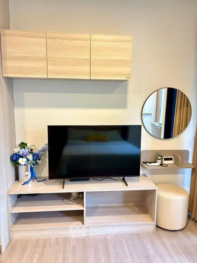 Modern living room with stylish TV setup and elegant decor