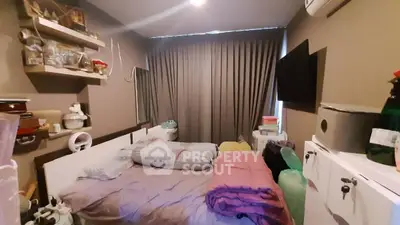Cozy bedroom with modern decor and ample storage space