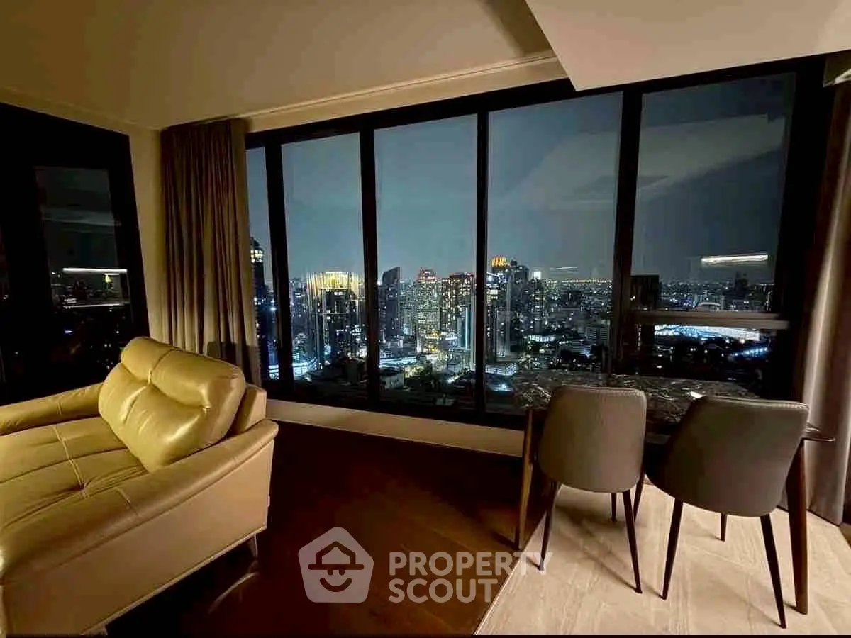 Luxurious living room with stunning city skyline view at night