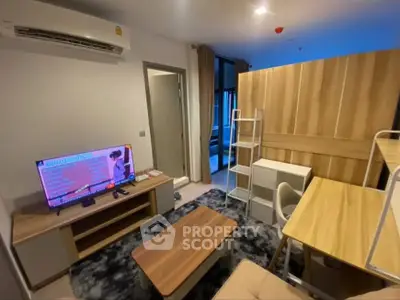 Modern living room with stylish furniture and air conditioning in a cozy apartment.