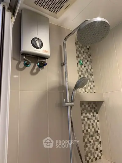 Modern bathroom shower with water heater and stylish tile design