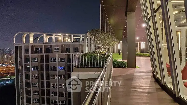 Stunning rooftop view with modern architecture and cityscape at night