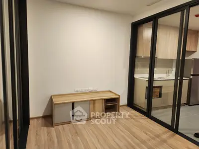 Modern apartment with sleek kitchen and spacious living area