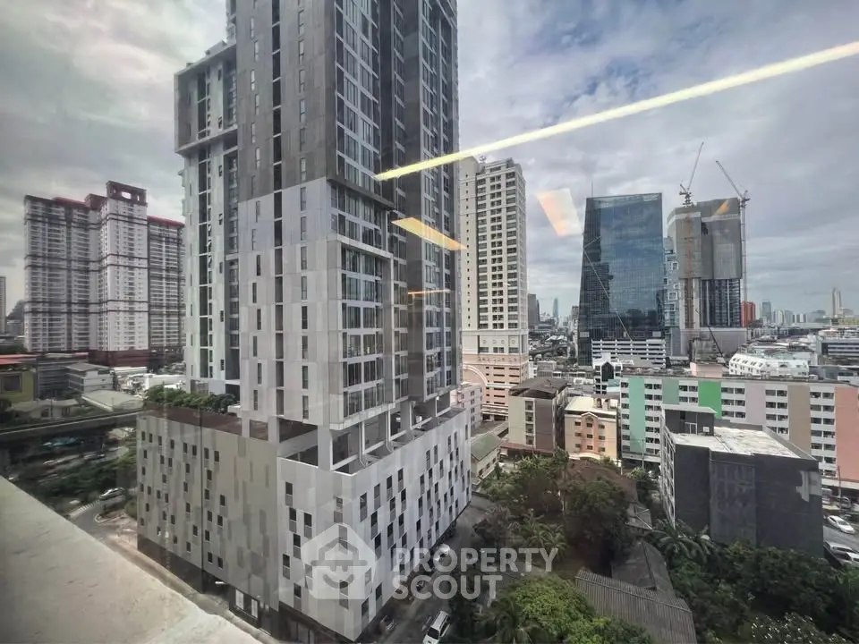 Stunning cityscape view showcasing modern high-rise buildings and urban skyline.