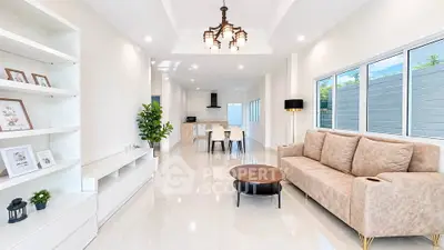 Spacious modern living room with elegant decor and natural light