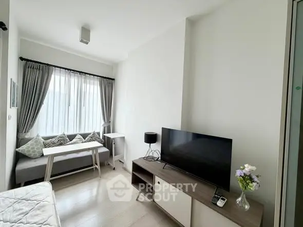 Modern living room with sleek furniture and natural light