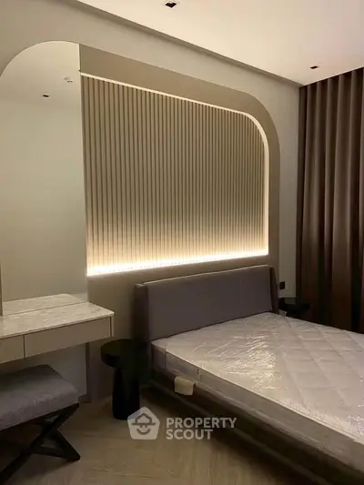 Modern bedroom with stylish lighting and elegant decor