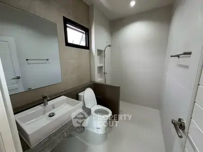 Modern bathroom with sleek design and spacious shower area