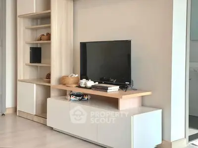 Modern living room with sleek TV unit and stylish shelving