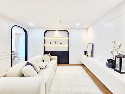 Modern living room with elegant decor and cozy seating area