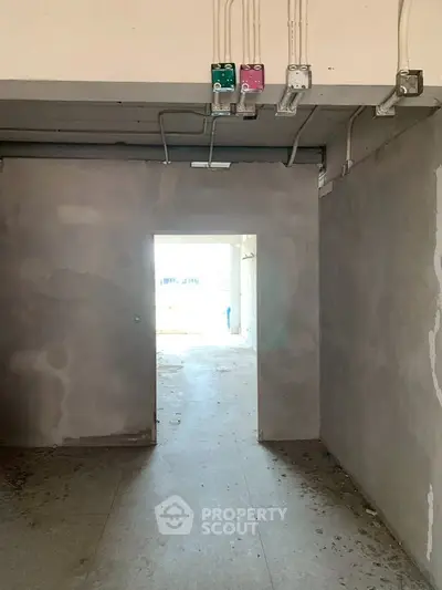 Spacious unfinished interior with potential for customization and renovation.