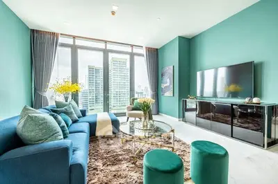 Luxurious modern living room with stunning city view and elegant decor