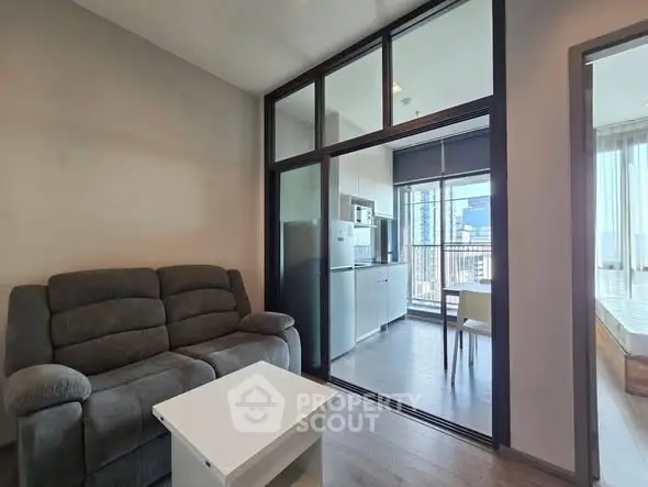 Modern apartment with cozy living room and kitchen open layout