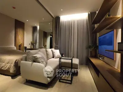 Modern studio apartment with cozy living area and stylish decor