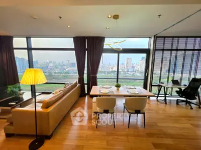 Luxurious living room with panoramic city view, elegant dining area, and modern decor in high-rise apartment.