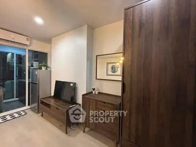 Modern living room with wooden furniture and sleek decor