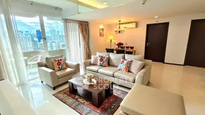 Spacious living room with city view and elegant decor