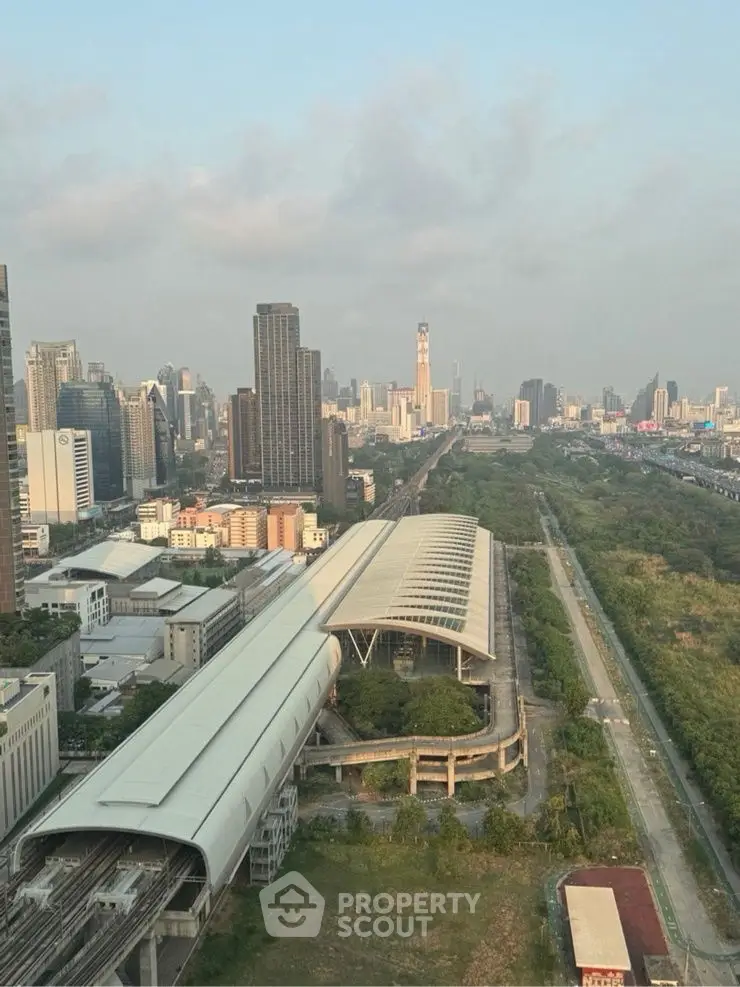 Stunning cityscape view with modern architecture and lush greenery, perfect for urban living enthusiasts.