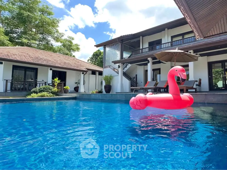 Luxurious villa with private pool and modern architecture, perfect for relaxation and entertaining.