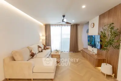 Spacious modern living room with elegant decor and natural light
