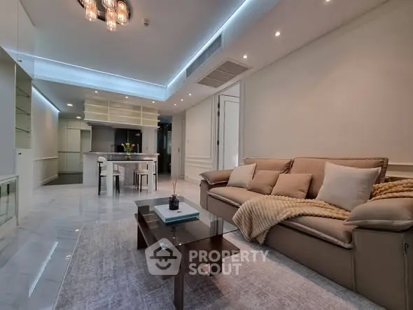 Modern living room with elegant lighting and cozy seating area