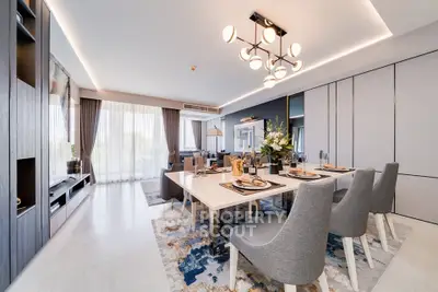 Luxurious dining room with elegant decor and modern lighting in a spacious apartment.
