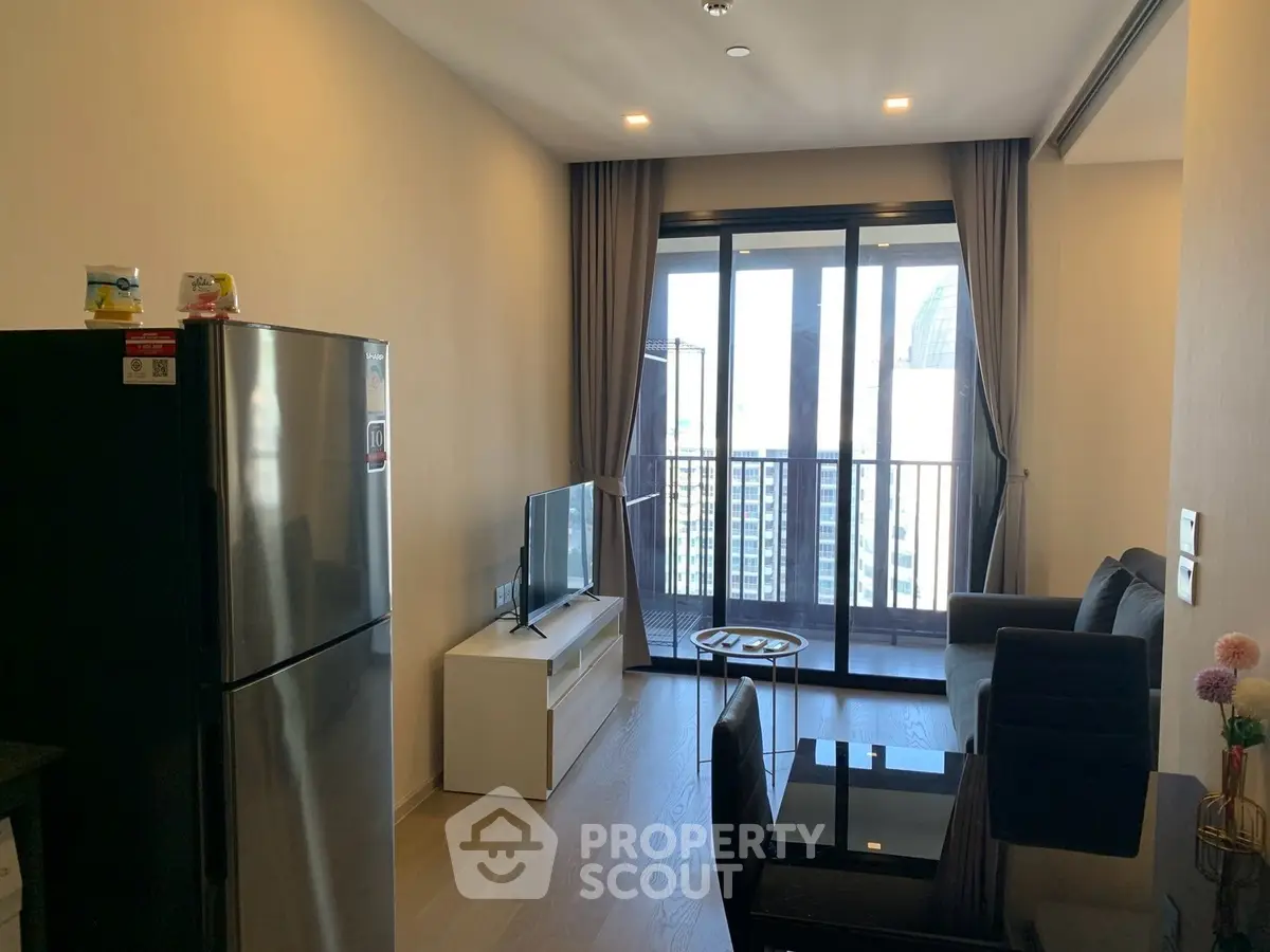 Modern living room with balcony view in high-rise apartment