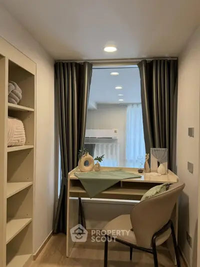 Cozy study nook with modern desk and chair, perfect for productivity.